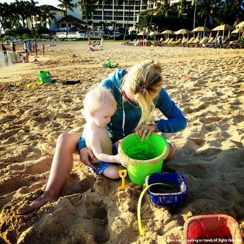 My friend Kim-Marie (The Luxury Travel Mom) plays in the sand with TY. 
