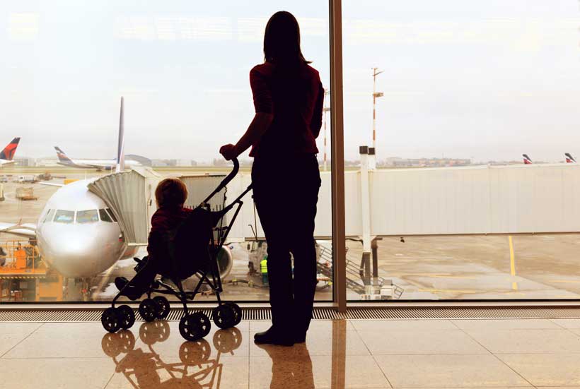 checking a stroller at the gate