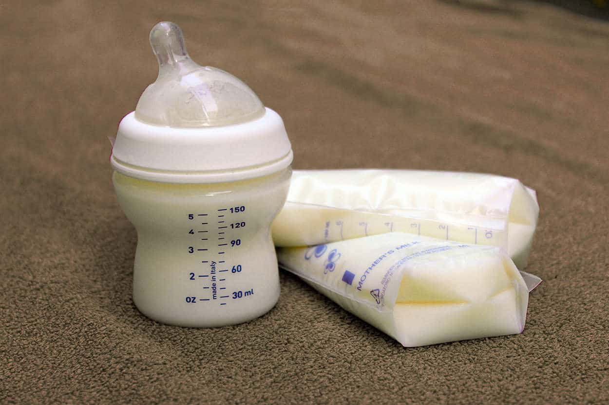 how to carry breast milk on a plane