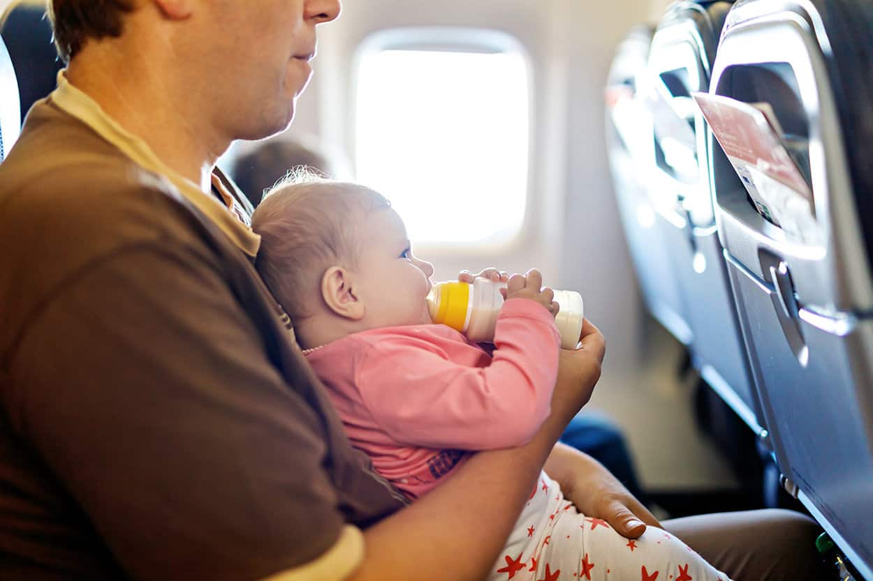 How to bottle feed a baby on a plane