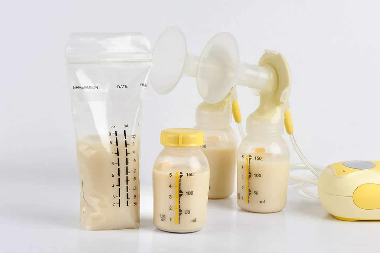 How to feed a baby a bottle of breast milk on a plane