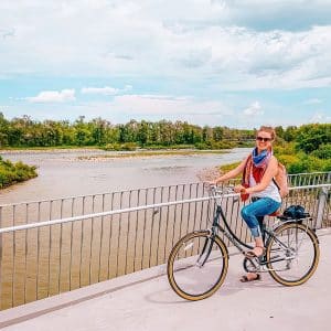Keryn biking the Bow River Pathway