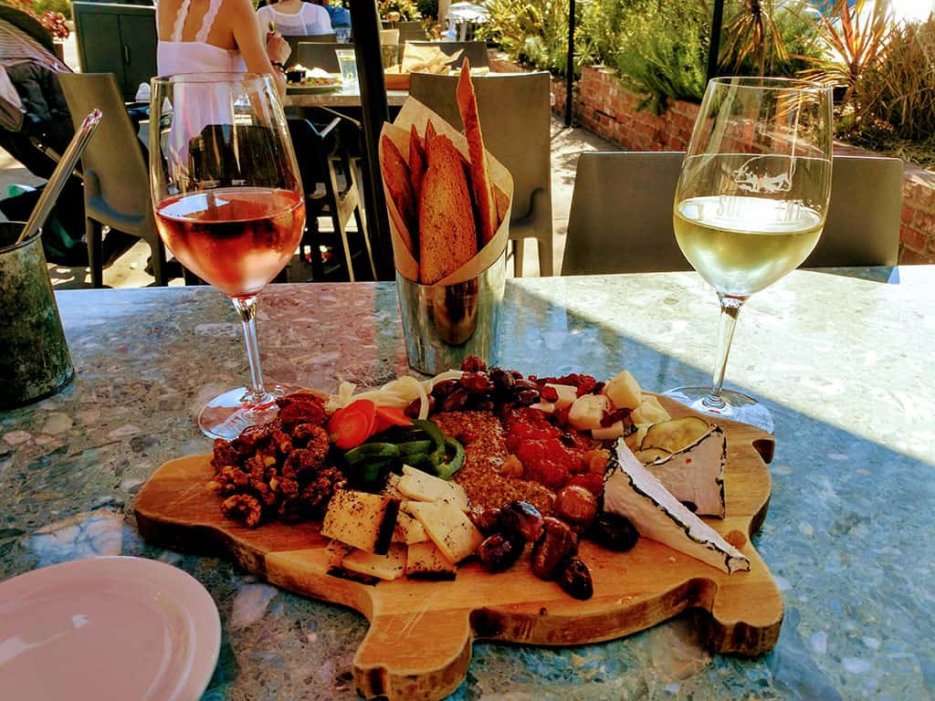 Wine and cheese in Solvang California- credit Keryn Means of Twist Travel Magazine