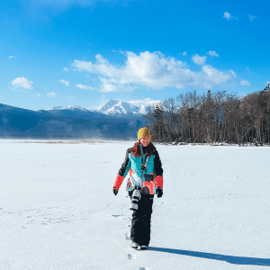 Keryn walking across a frozen Lake Akan in winter in East Hokkaido Japan- photo credit Keryn Means
