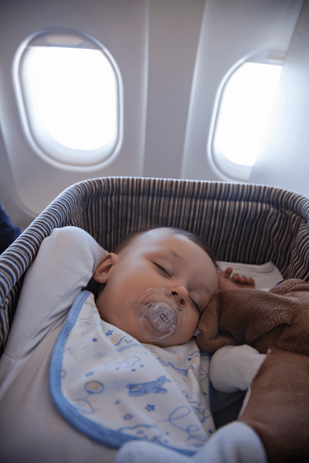 25 Secrets to Baby Travel You Need to Know 3 baby sleeping on a plane